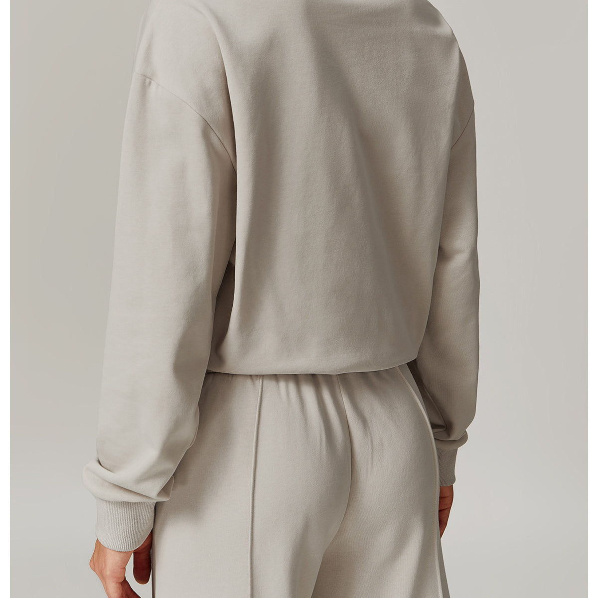 Light gray lounge set featuring a Loose Round Neck Sports Sweater for stylish comfort in ملابس