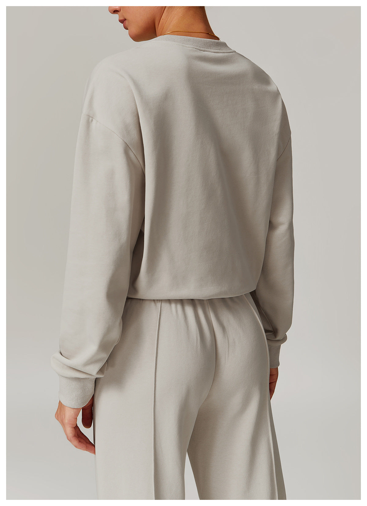 Light gray lounge set featuring a Loose Round Neck Sports Sweater for stylish comfort in ملابس