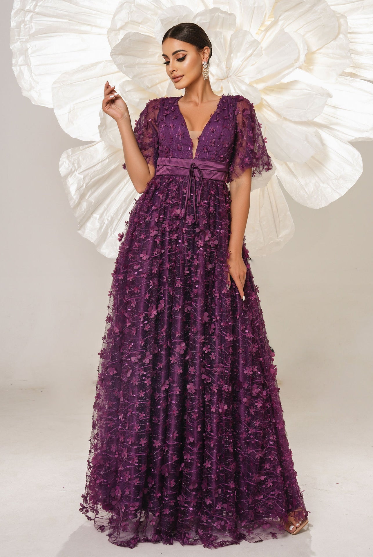 Elegant purple floral-embellished gown from Langry fashion collection for bridesmaid or evening wear