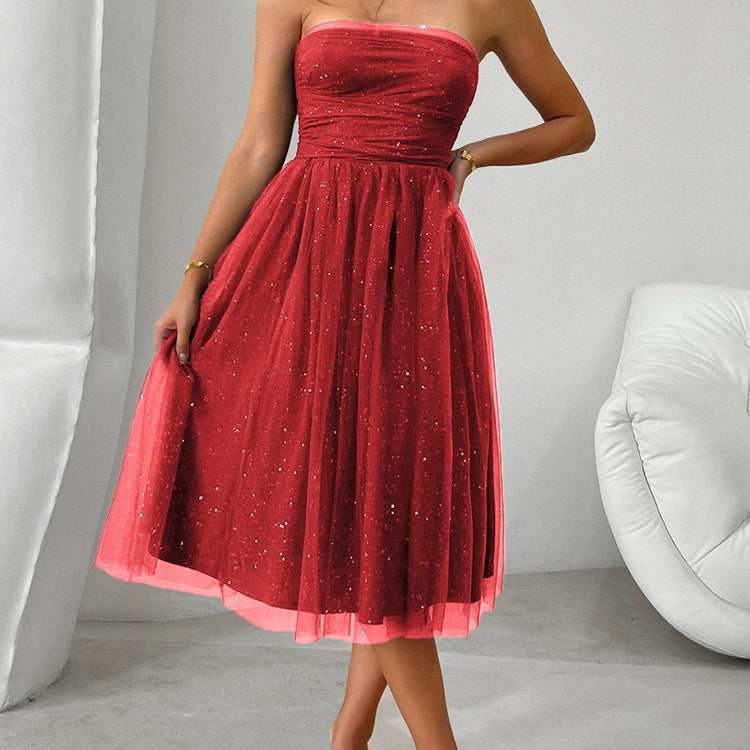 Strapless red tulle cocktail dress with sparkly details, perfect for elegant fashion occasions