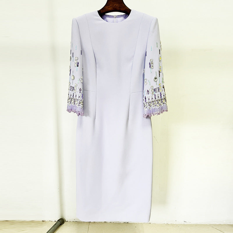 Lavender sheath dress with embellished sleeves, perfect for elegant fashion moments