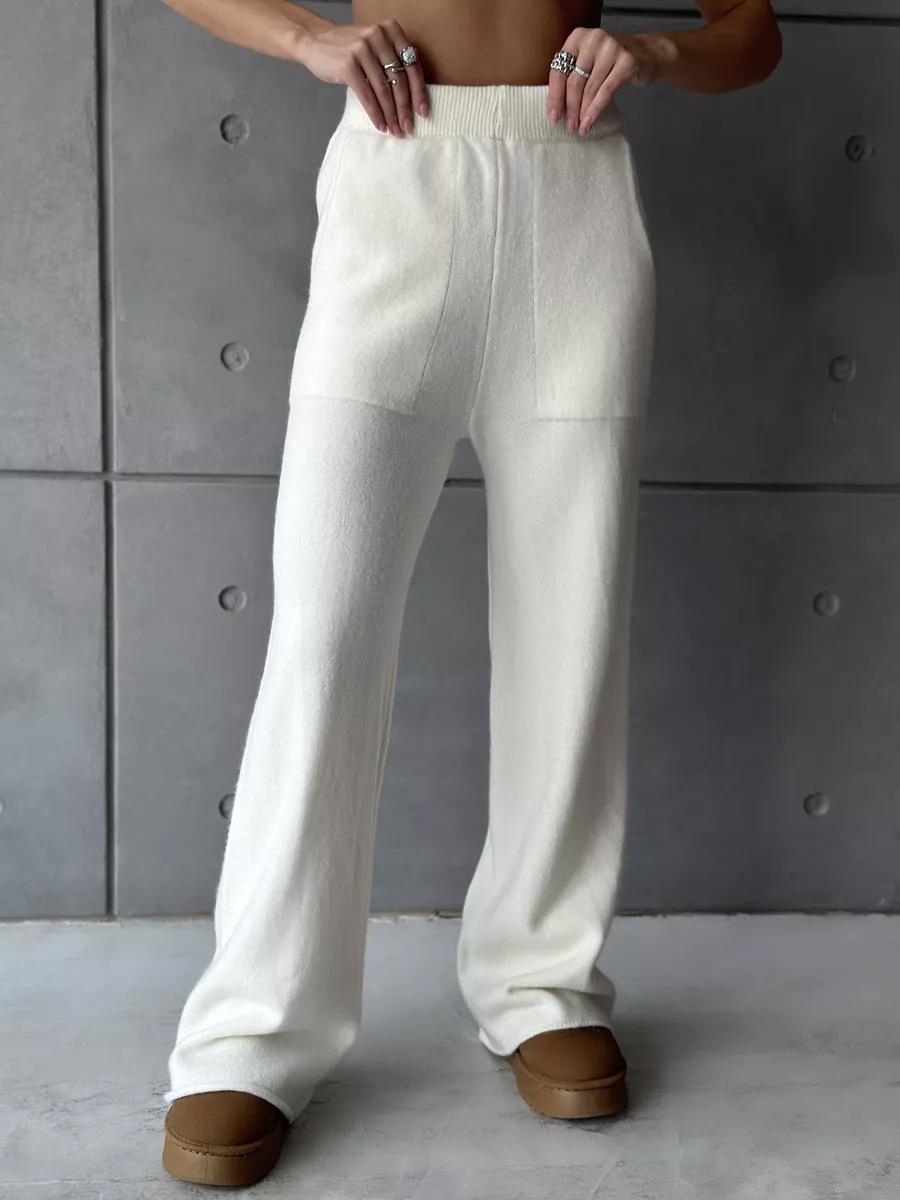 Cream-colored knit pants featured in High Collar Zipper Knitted Sweater Suit for stylish fashion ملابس