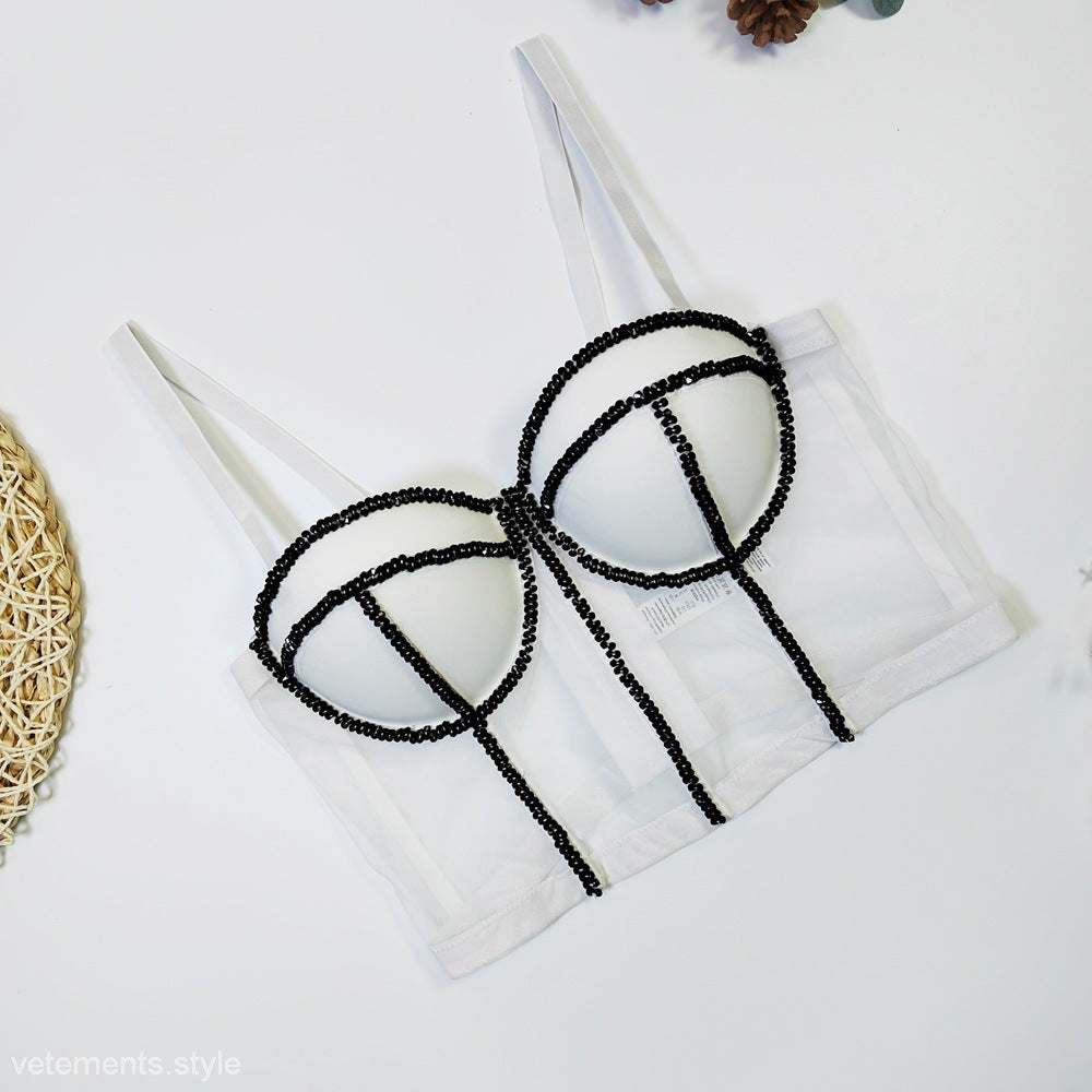 White bustier top with black beaded outline in glasses design, featuring transparent white crystal