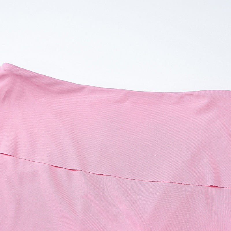 Pink fabric with a folded seam showcasing a stylish Summer Women Clothing two-piece suit