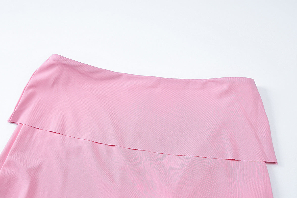 Pink fabric with a folded seam showcasing a stylish Summer Women Clothing two-piece suit