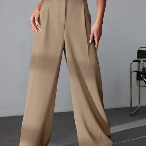 Wide leg khaki trousers featuring a high waist and pressed creases for stylish fashion