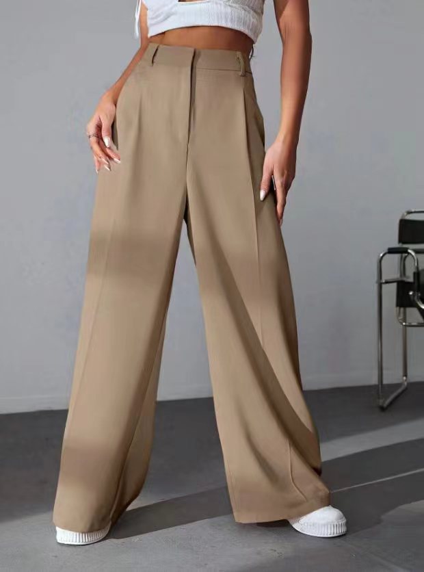 Wide leg khaki trousers featuring a high waist and pressed creases for stylish fashion