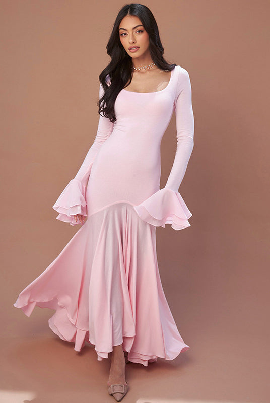 Pale pink long-sleeved mermaid dress with ruffled sleeves, perfect for fashion lovers