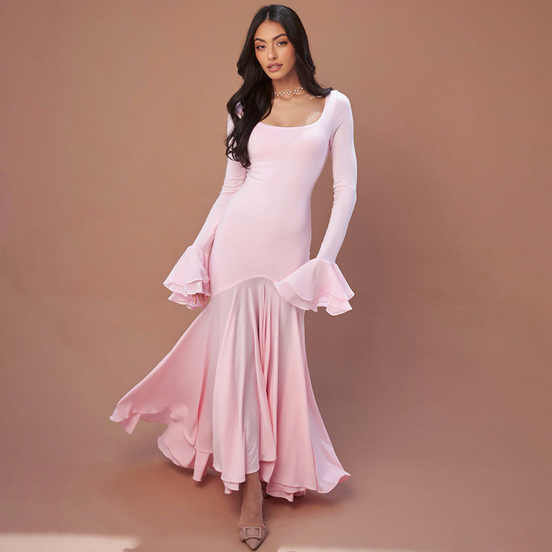 Pale pink long-sleeved mermaid dress with ruffled sleeves, perfect for fashion lovers