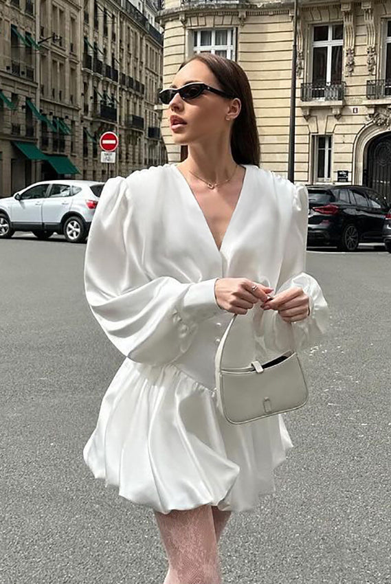 Elegant white satin mini dress with V-neck lantern sleeves for stylish casual fashion
