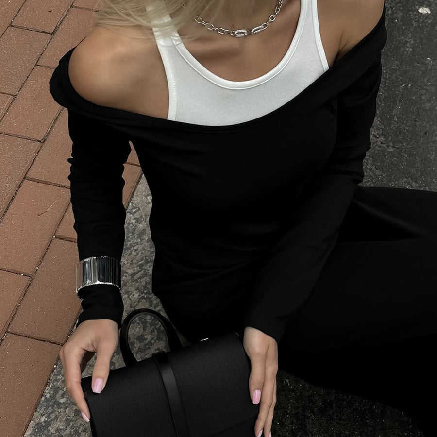 Black leather handbag with flap closure complementing Attractive Two Piece Vest Dress fashion