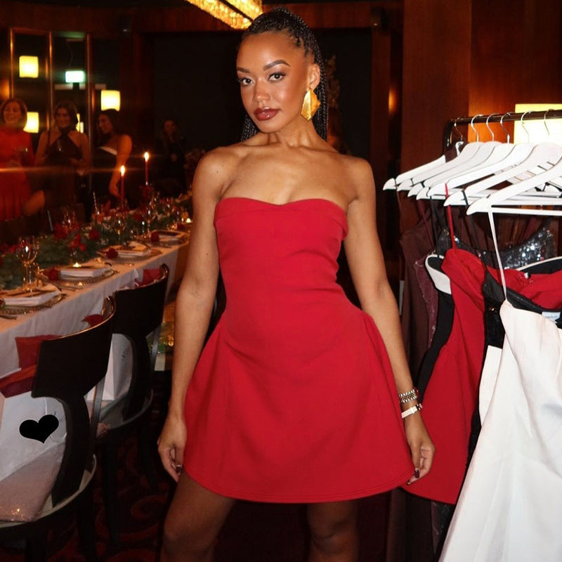 Strapless red cocktail dress with fitted bodice and flared skirt, perfect for elegant occasions