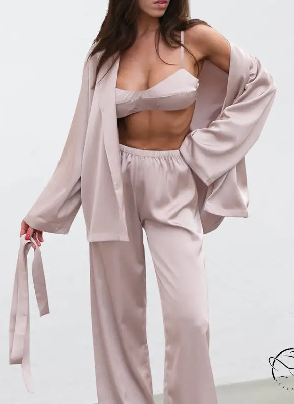 Light pink satin pajamas set with bralette, pants and robe