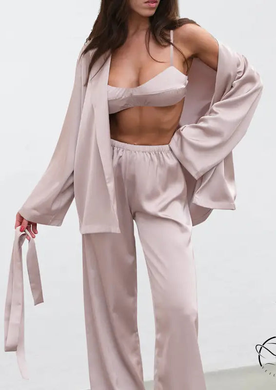 Light pink satin pajamas set with bralette, pants and robe
