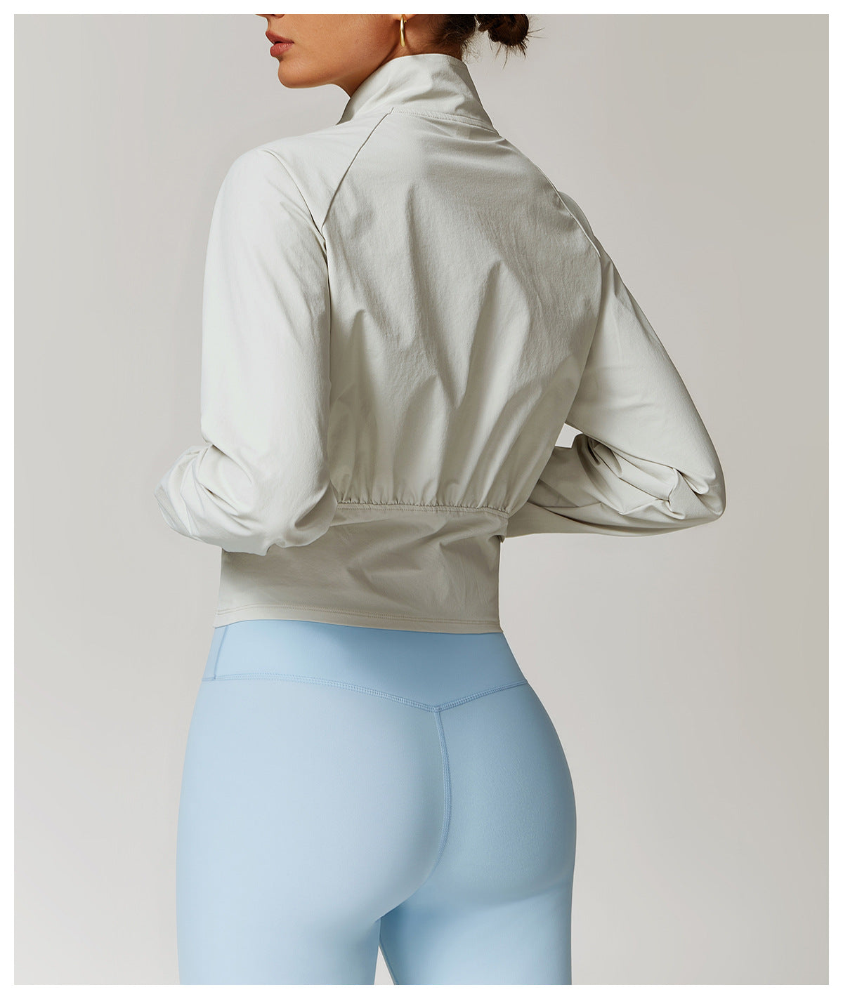 Light blue high-waisted leggings and beige cropped jacket for fashionable langry ملابس