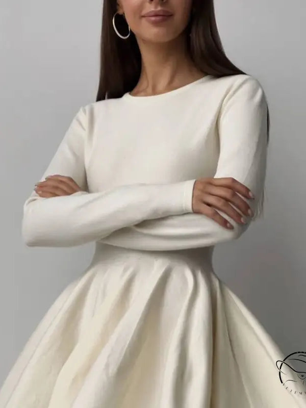 Elegant white long-sleeved beautiful woolen knitted dress
