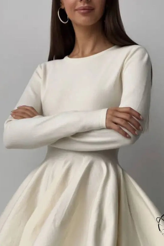 Elegant white long-sleeved beautiful woolen knitted dress