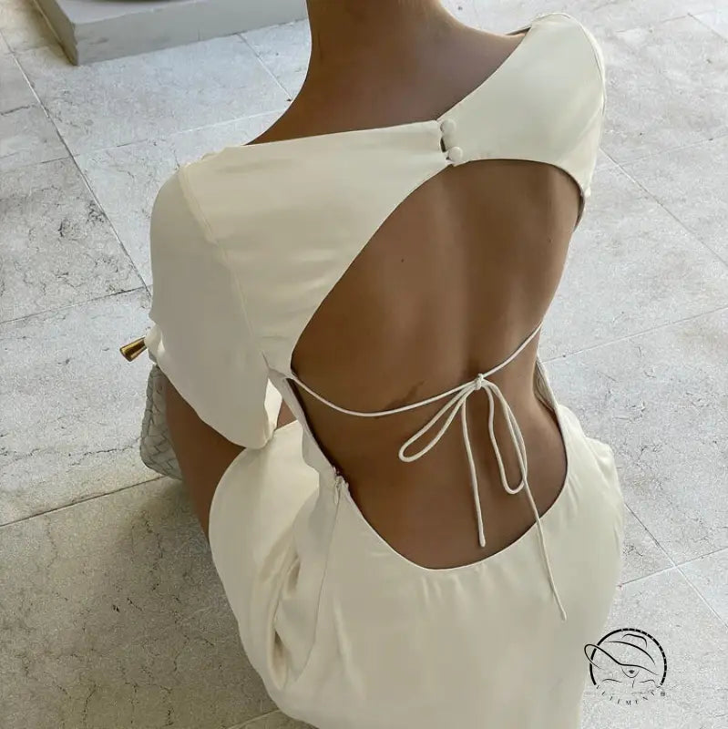 Enchanting short A-line dress in backless white with tie closure