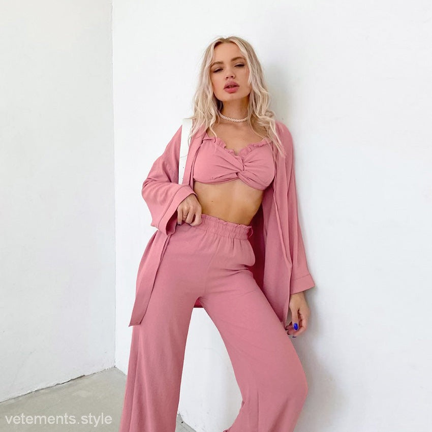 Woman in pink sweet ruffled pajamas with ruffled wrapped chest and chest gauze design