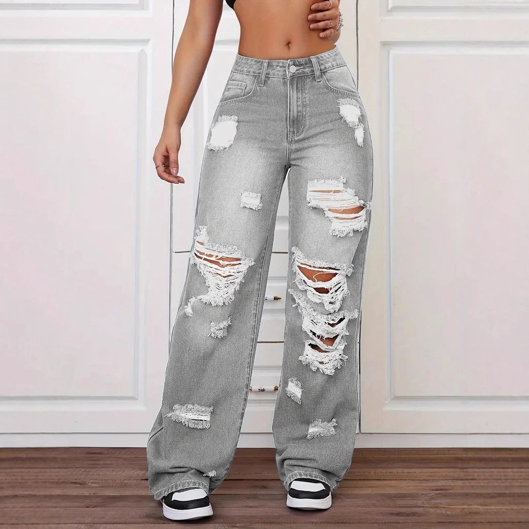 Light gray distressed high-waisted Langry fashion jeans with white soles