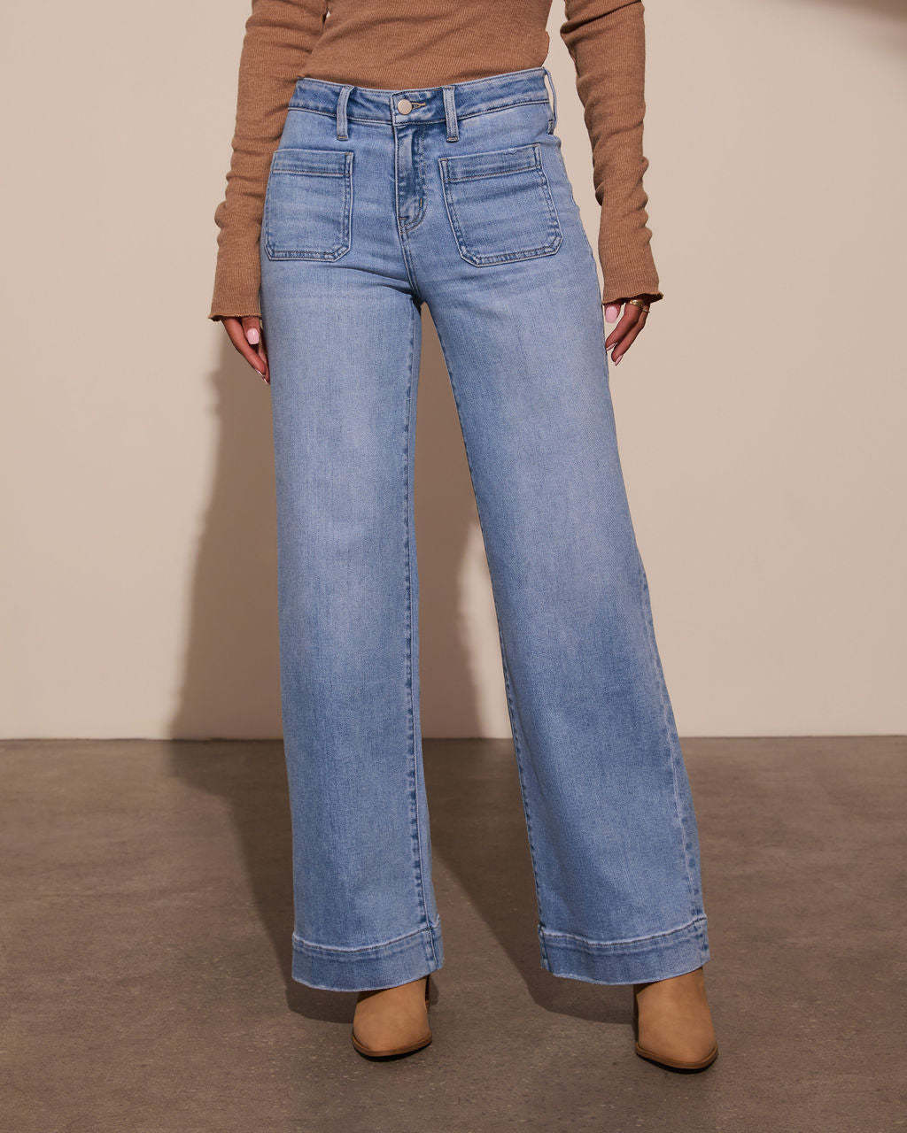 Light-wash wide-leg denim jeans from Stunning High Waist Straight Jeans, perfect for fashion lovers