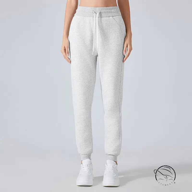 Light gray casual loose tapered sports pants with elastic cuffs