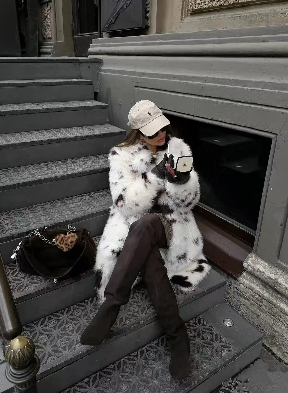 Cozy faux fur long coat with white black speckled hood by Mackage fashion