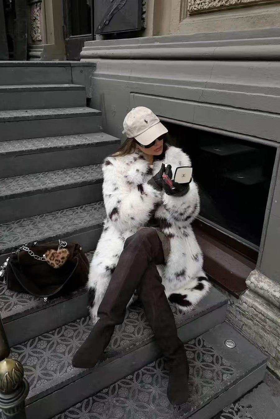 Cozy faux fur long coat with white black speckled hood by Mackage fashion