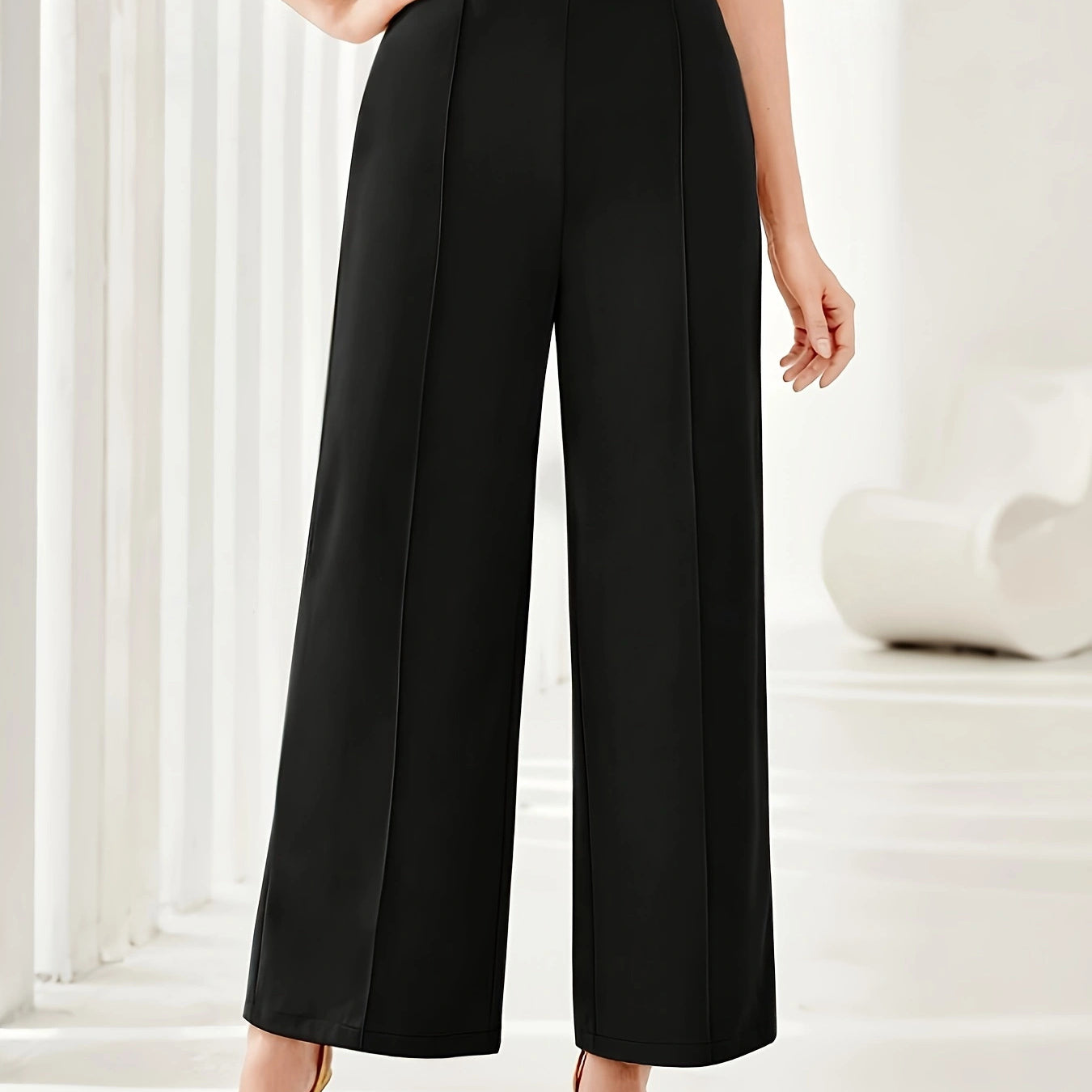 Black high-waisted wide leg dress pants with pressed creases for elegant fashion