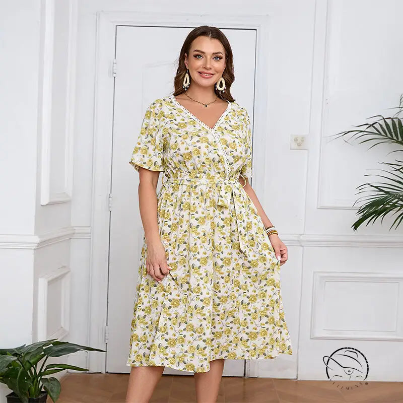 Boho lace floral dress with white V-neck, tie waist, and short sleeves