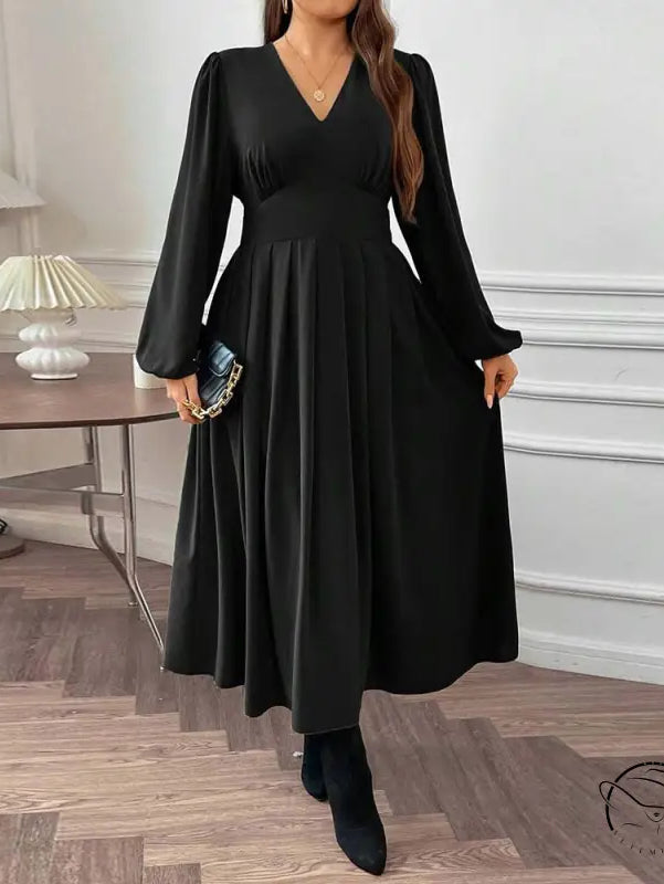 Gorgeous large swing dress: black V-neck midi with pleated skirt