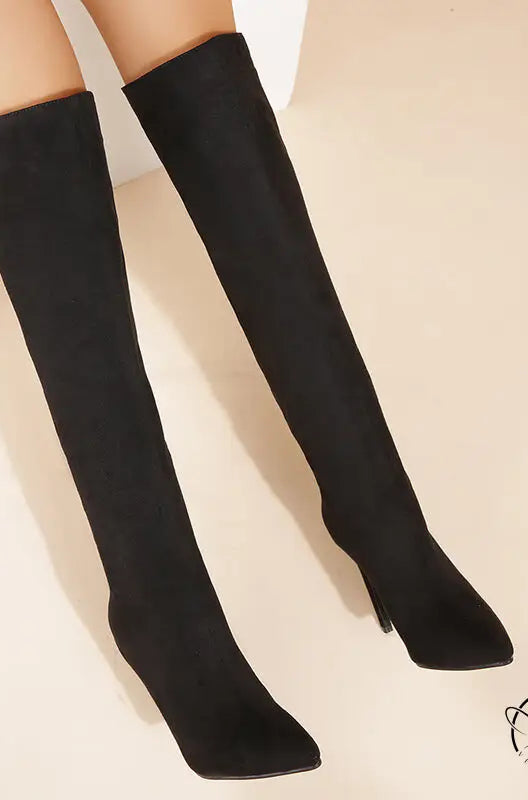 Black stiletto-heeled over-the-knee boots in langry fashion