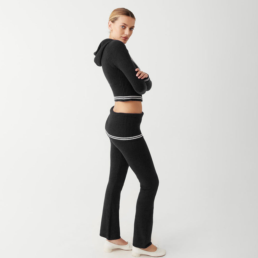 Black knitwear set featuring a slim fit hoodie and bootcut pants in trendy fashion style