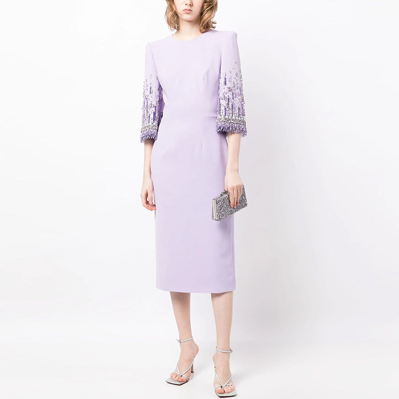 Lavender midi dress with embellished sleeves, perfect for elegant fashion occasions