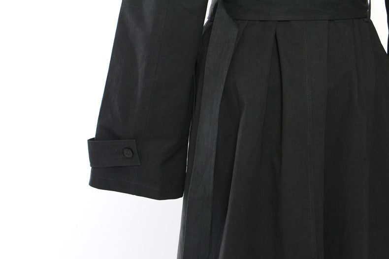 Langry casual trench coat in black with rolled cuffs and belt detail