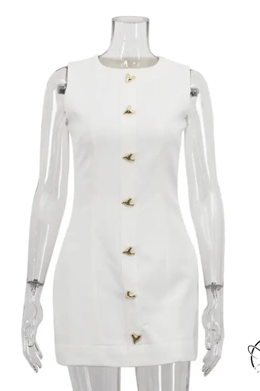 White short French dress with gold buttons and straps