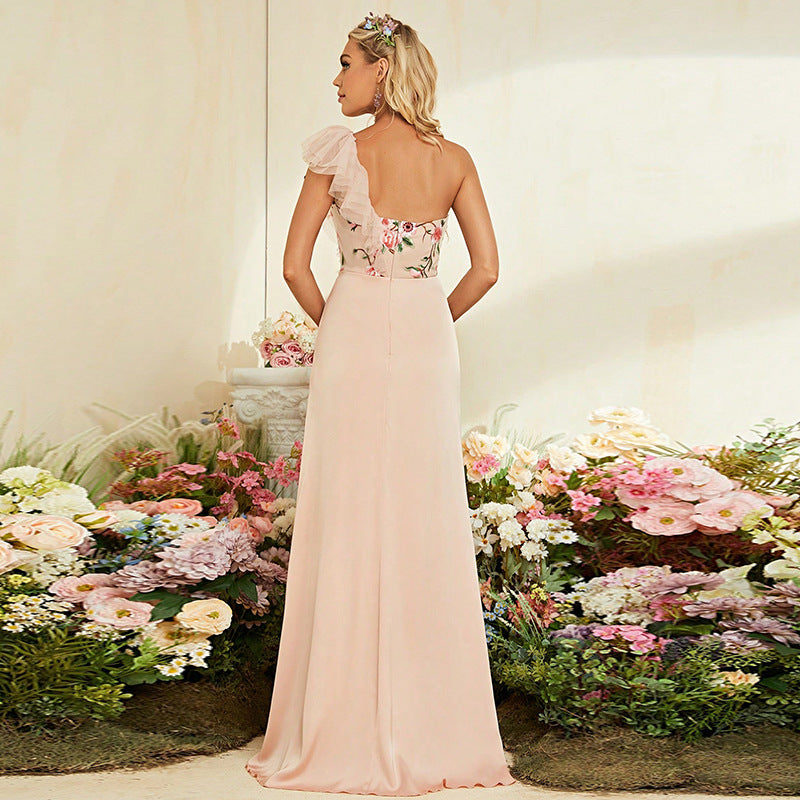 Elegant one-shoulder pink evening gown with floral embellishments for formal fashion ملابس