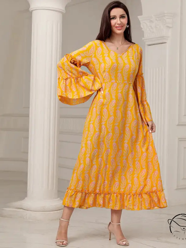 Elegant casual bell sleeve dress in vibrant yellow with pink paisley