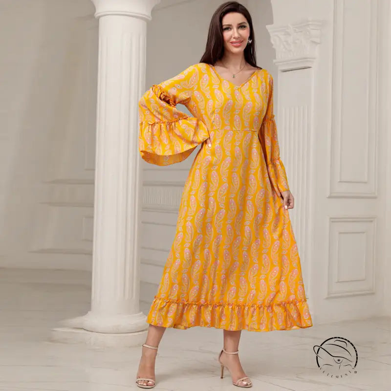 Elegant casual bell sleeve dress in vibrant yellow with pink paisley