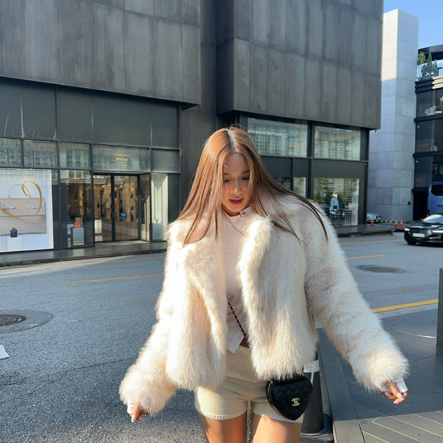 Cream faux fur jacket with black trim, white collar, oversized Langry fashion design