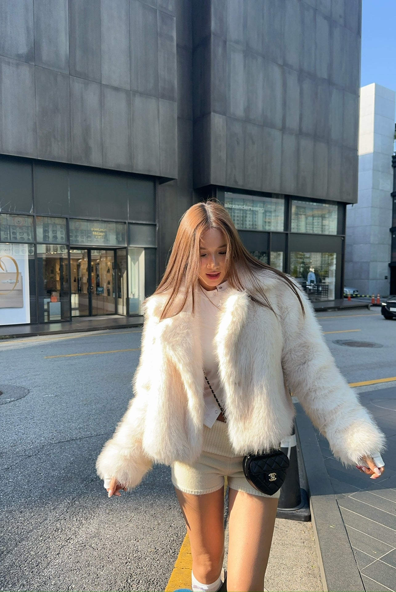 Cream faux fur jacket with black trim, white collar, oversized Langry fashion design