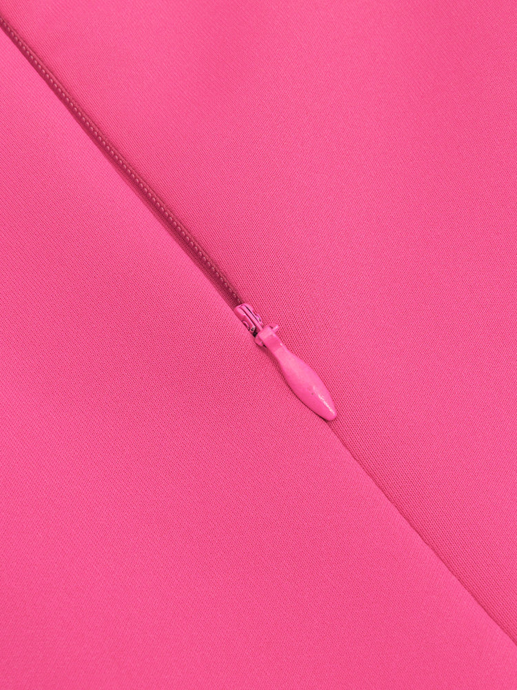 Elegant shoulder ruffled cocktail dress in fuchsia pink with discreet side zipper