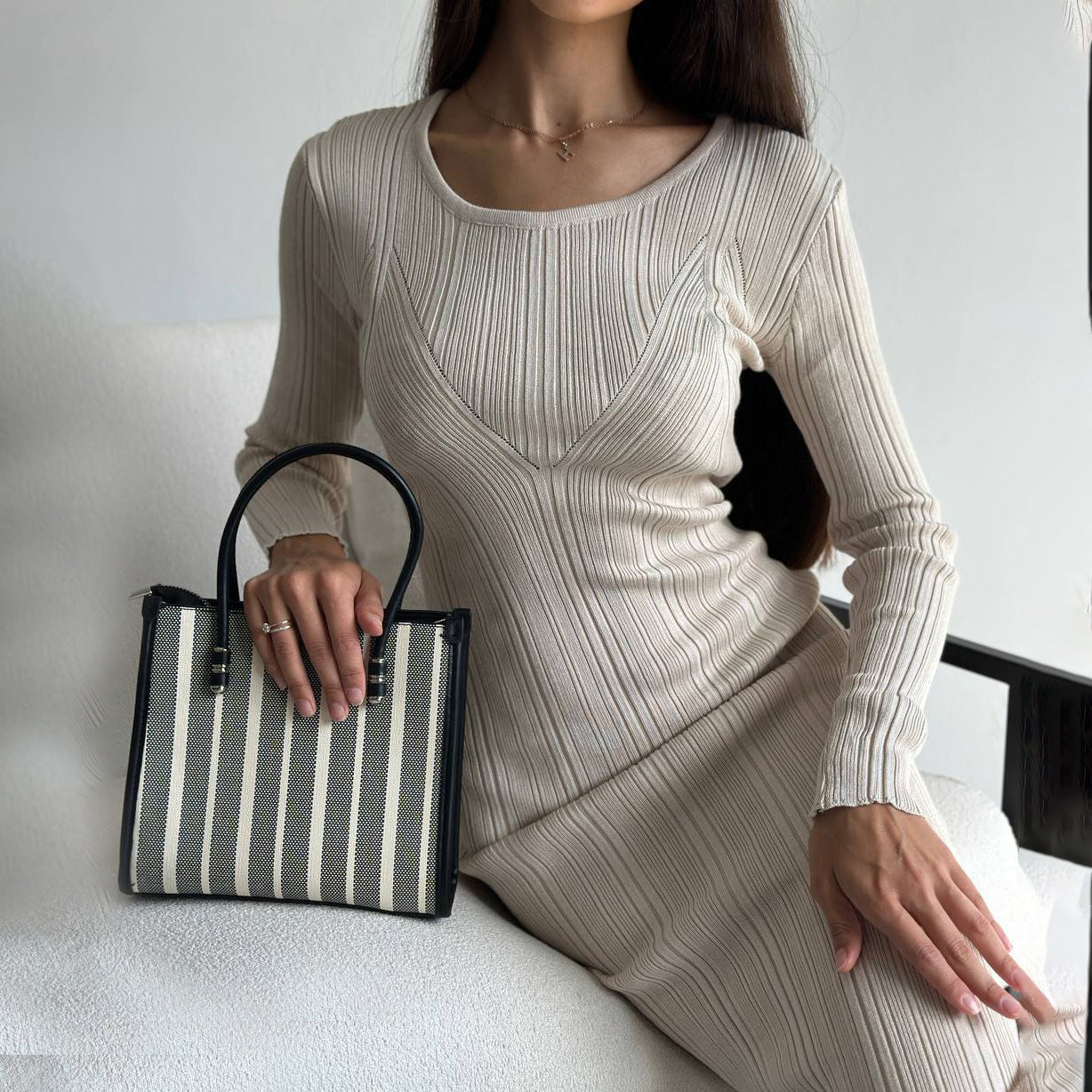 Ribbed knit dress paired with a stylish striped tote bag for trendy fashion ملابس