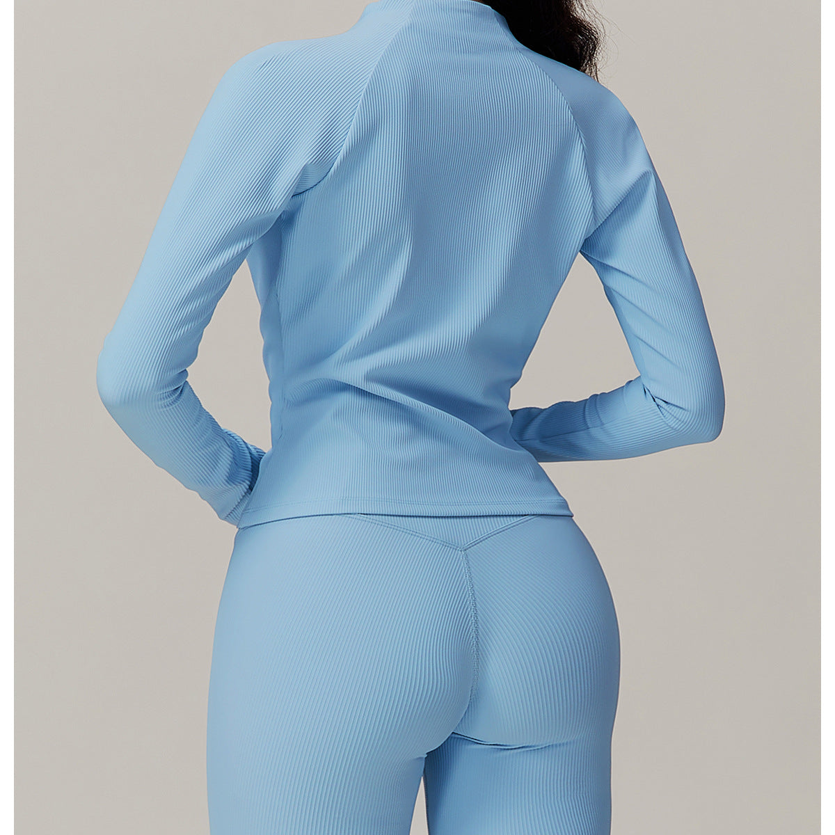 Light blue long-sleeved workout romper with shorts for casual running fashion ملابس