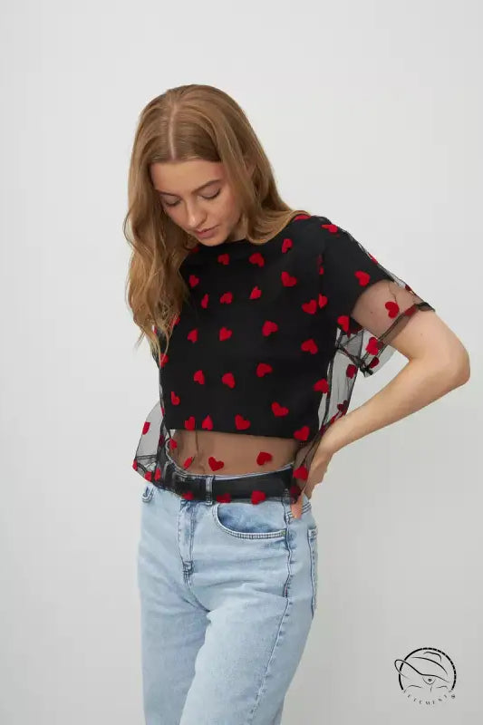 Elegant faux cotton short black mesh crop top with red heart pattern and light wash jeans
