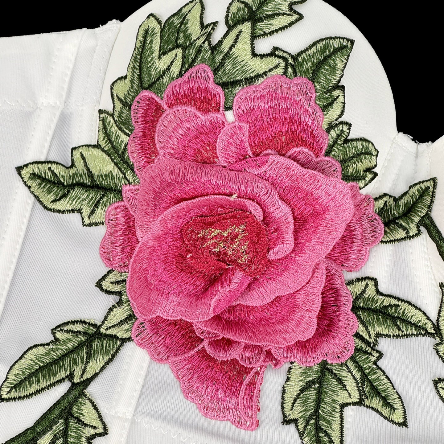 Pink rose embroidered patch on Langry floral corset fabric