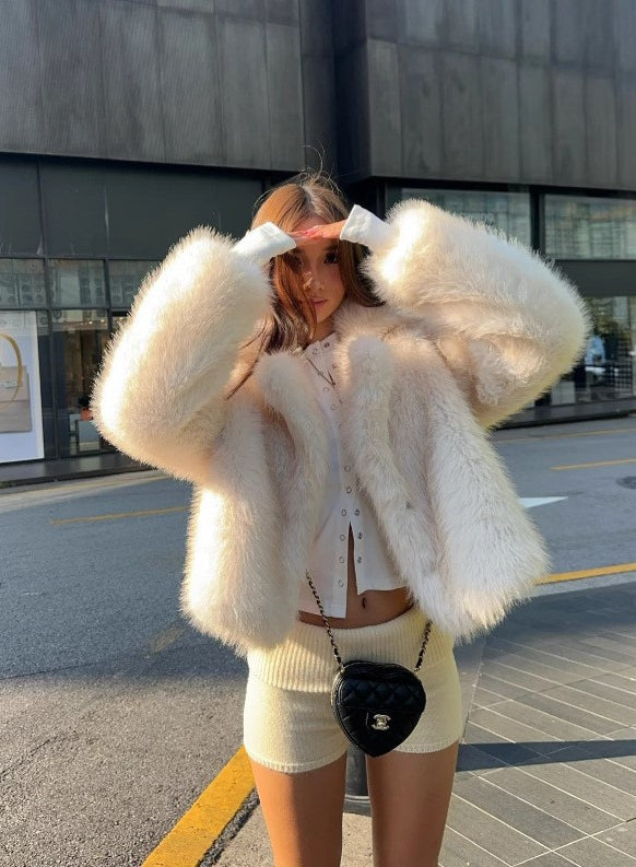 Cream fluffy faux fur jacket in Langry fashion, cropped with wide sleeves