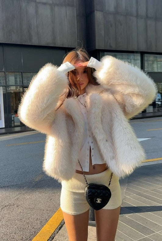 Cream fluffy faux fur jacket in Langry fashion, cropped with wide sleeves