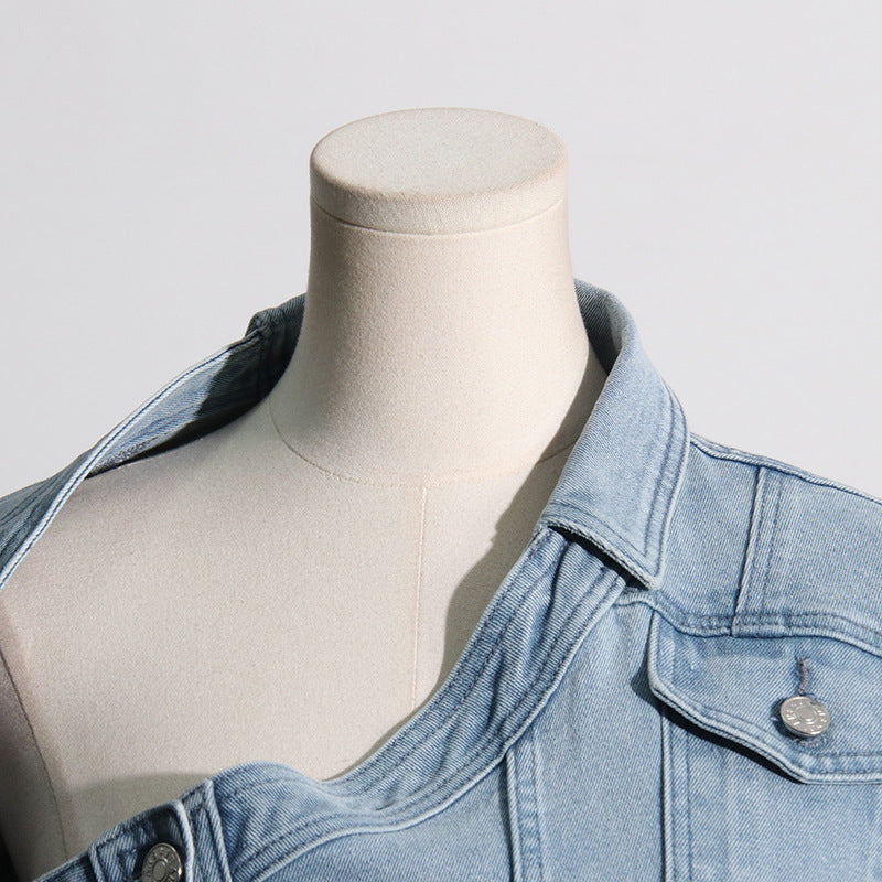 Light blue denim jacket on a mannequin showcasing Off the Shoulder Design Fashion style