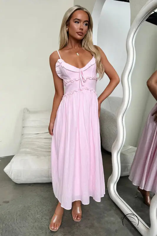 Elegant loose dress: light pink midi sundress with spaghetti straps
